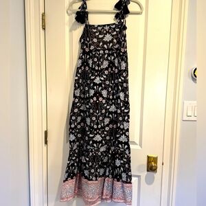 Boho sun dress with adjustable shoulder tie straps with tassels.